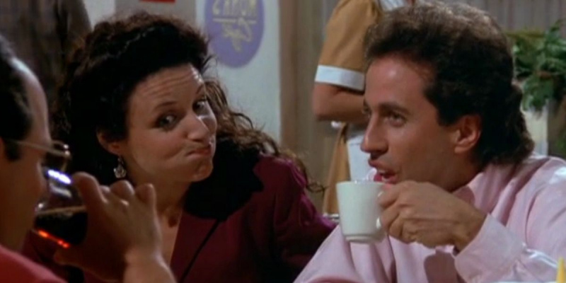   Elaine หัวเราะในขณะที่ Jerry ดูตกใจใน Seinfeld