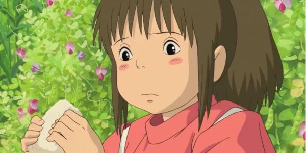 Чихиро Spirited Away ойынында Онигириді жеп жатыр